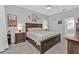 Large main bedroom with king-size bed and ensuite bathroom access at 24304 Westgate Blvd, Port Charlotte, FL 33980