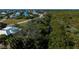 Aerial view of waterfront property with canal access at 24362 Yacht Club Blvd, Punta Gorda, FL 33955