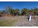 Large backyard with garden and playset at 24362 Yacht Club Blvd, Punta Gorda, FL 33955