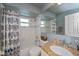 Bathroom with tub, shower, and granite countertop at 24362 Yacht Club Blvd, Punta Gorda, FL 33955