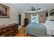 Spacious bedroom with hardwood floors and large windows at 24362 Yacht Club Blvd, Punta Gorda, FL 33955