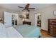 Spacious bedroom with ensuite bathroom access and large closet at 24362 Yacht Club Blvd, Punta Gorda, FL 33955