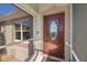 Elegant front door entrance with screened porch and window at 24362 Yacht Club Blvd, Punta Gorda, FL 33955