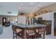 Open kitchen boasting stainless steel appliances and a breakfast bar at 24362 Yacht Club Blvd, Punta Gorda, FL 33955