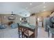 Open concept kitchen with breakfast bar and view of living room at 24362 Yacht Club Blvd, Punta Gorda, FL 33955