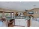 Kitchen with an island, double sink, and views into the living room at 24362 Yacht Club Blvd, Punta Gorda, FL 33955
