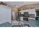 Kitchen with stainless steel appliances and island at 24362 Yacht Club Blvd, Punta Gorda, FL 33955