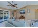 Living room with access to lanai at 24362 Yacht Club Blvd, Punta Gorda, FL 33955
