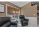 Sitting area with two leather recliners and window seat at 24362 Yacht Club Blvd, Punta Gorda, FL 33955