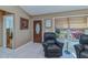 Sunroom with comfy leather recliners and view of backyard at 24362 Yacht Club Blvd, Punta Gorda, FL 33955