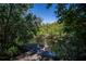 Calm canal waterfront view from the backyard at 24362 Yacht Club Blvd, Punta Gorda, FL 33955