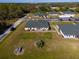 Aerial view showcasing a residential building with surrounding landscape at 24540 Harborview Rd # E4, Port Charlotte, FL 33980