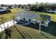 Single-story house with grey roof and driveway at 25075 Palisade Rd, Punta Gorda, FL 33983