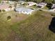 Aerial view showcasing the house and surrounding neighborhood at 25075 Palisade Rd, Punta Gorda, FL 33983