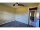 Spacious bedroom with tile flooring and access to another room at 25075 Palisade Rd, Punta Gorda, FL 33983