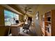 Home office boasts built-in shelving and hardwood floors at 25075 Palisade Rd, Punta Gorda, FL 33983