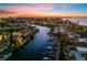 Beautiful aerial view of waterfront homes and canals at sunset at 25188 Marion Ave # 12, Punta Gorda, FL 33950