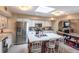 Updated kitchen with stainless steel appliances, a center island, and skylight at 25188 Marion Ave # 12, Punta Gorda, FL 33950