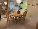 Elegant dining room with a table and chairs at 25188 Marion Ave # F201, Punta Gorda, FL 33950