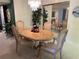 Bright dining room with oval table and chairs, ideal for Gathering meals at 25188 Marion Ave # F201, Punta Gorda, FL 33950