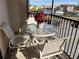 Enjoy water views from this spacious screened balcony with seating at 25188 Marion Ave # F201, Punta Gorda, FL 33950