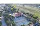 An aerial view of a house near the community pool and golf course at 26166 Stillwater Cir, Punta Gorda, FL 33955