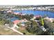 An aerial view of a house with the community pool and other amenities nearby at 26166 Stillwater Cir, Punta Gorda, FL 33955