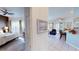 Hallway view of bedroom and living area, showcasing the open layout and stylish decor at 26166 Stillwater Cir, Punta Gorda, FL 33955