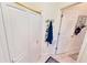 Hallway with closet and shelving at 26166 Stillwater Cir, Punta Gorda, FL 33955