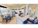 Charming kitchen with breakfast nook, stainless steel appliances, and white cabinetry at 26166 Stillwater Cir, Punta Gorda, FL 33955