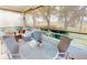 Inviting patio with ample seating, perfect for enjoying the outdoors and green golf course views at 26166 Stillwater Cir, Punta Gorda, FL 33955