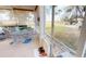 Spacious screened patio with outdoor seating and beautiful views of well maintained lawn at 26166 Stillwater Cir, Punta Gorda, FL 33955