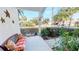 Inviting front porch with comfortable seating and views of the community at 26166 Stillwater Cir, Punta Gorda, FL 33955