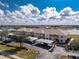 Aerial view of condo building and parking at 26397 Nadir Rd # 208, Punta Gorda, FL 33983