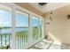 Balcony with lake and pool view at 26397 Nadir Rd # 208, Punta Gorda, FL 33983