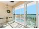 Relaxing balcony overlooking a lake and pool at 26397 Nadir Rd # 208, Punta Gorda, FL 33983