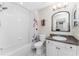 Clean bathroom with a tub shower combo and vanity at 26397 Nadir Rd # 208, Punta Gorda, FL 33983