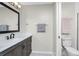 Bathroom with vanity, quartz countertop, and tiled floor at 26397 Nadir Rd # 208, Punta Gorda, FL 33983