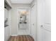 Laundry room with stackable washer/dryer and access to bathroom at 26397 Nadir Rd # 208, Punta Gorda, FL 33983