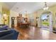 Bright dining room with hardwood floors and view of backyard at 26572 Trinilas Dr, Punta Gorda, FL 33983