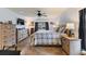Main bedroom with a king-size bed and ample closet space at 26572 Trinilas Dr, Punta Gorda, FL 33983