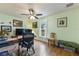 Home office with a desk, chair, and large window at 26572 Trinilas Dr, Punta Gorda, FL 33983