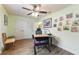 Home office with a desk and chair, offering natural light at 26572 Trinilas Dr, Punta Gorda, FL 33983