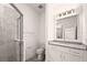 Bathroom features granite vanity, tiled shower, and modern lighting at 27066 Sumatra Dr, Punta Gorda, FL 33955