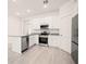 Modern kitchen with stainless steel appliances and granite countertops at 27066 Sumatra Dr, Punta Gorda, FL 33955