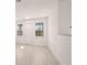 Bright living room with vinyl flooring and neutral color palette at 27066 Sumatra Dr, Punta Gorda, FL 33955