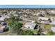 Aerial view showing house, yard, and neighborhood at 27131 Ann Arbor Ave, Punta Gorda, FL 33983