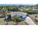 Aerial view of house, yard, and neighborhood at 27131 Ann Arbor Ave, Punta Gorda, FL 33983