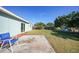 Large backyard with patio and grassy area at 27131 Ann Arbor Ave, Punta Gorda, FL 33983