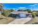 Single-story home with carport and fenced yard at 27131 Ann Arbor Ave, Punta Gorda, FL 33983